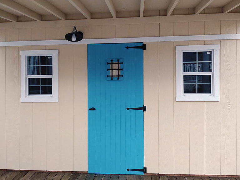3 greenbell tiny house pit8 deck door 1